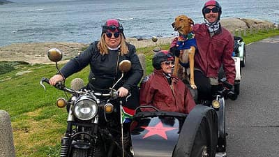 Motorcycle Sidecar Tours People Sitting in Sidecar Man With Dog