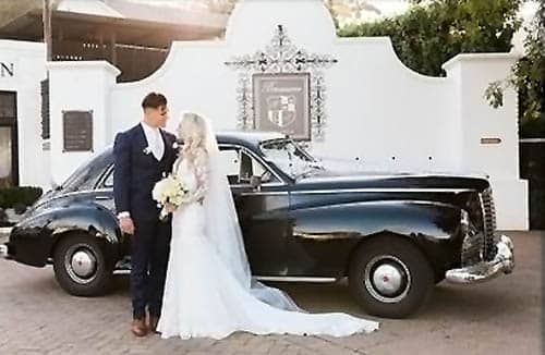 Rentals For Weddings Couple Next To 1947 Packard Sedan
