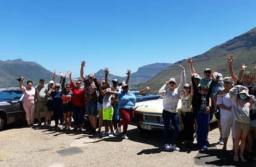 cape corporate tours cadillac tours and transfers group of people and cadillacs