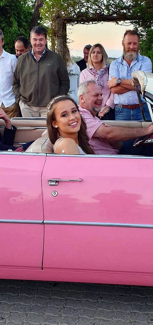 Cape Corporate Tours gallery Cadillac Tours & Trips Girl In Pink Convertible Cadillac