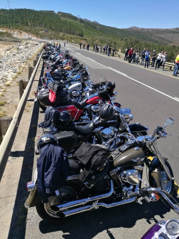 Harley Davidson Tours Motorcycles Lined Up On Mountain Pass