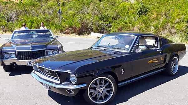 cape corporate tours classic car chauffeur drives classic seventies cars ford mustang and cadillac