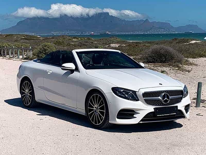 luxury cars white mercedes amg convertible table mountain backdrop