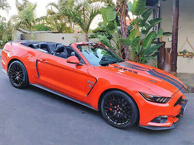 cape corporate tours car rentals muscle cars orange mustang-min