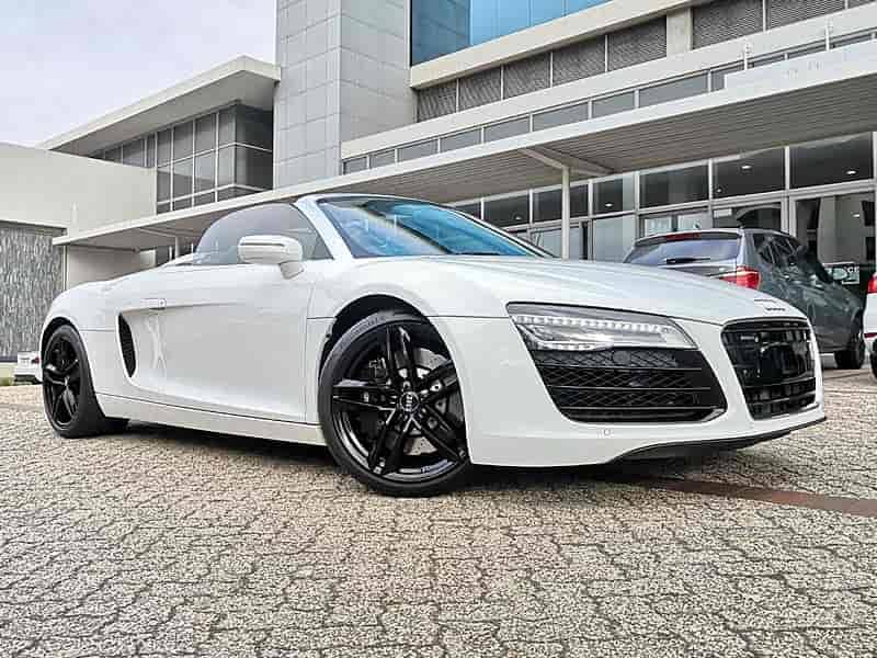 sports cars white audi r8 in front of cape town buildings
